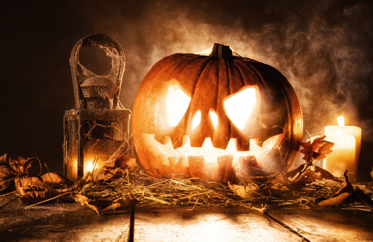 Scary halloween pumpkin on wooden planks