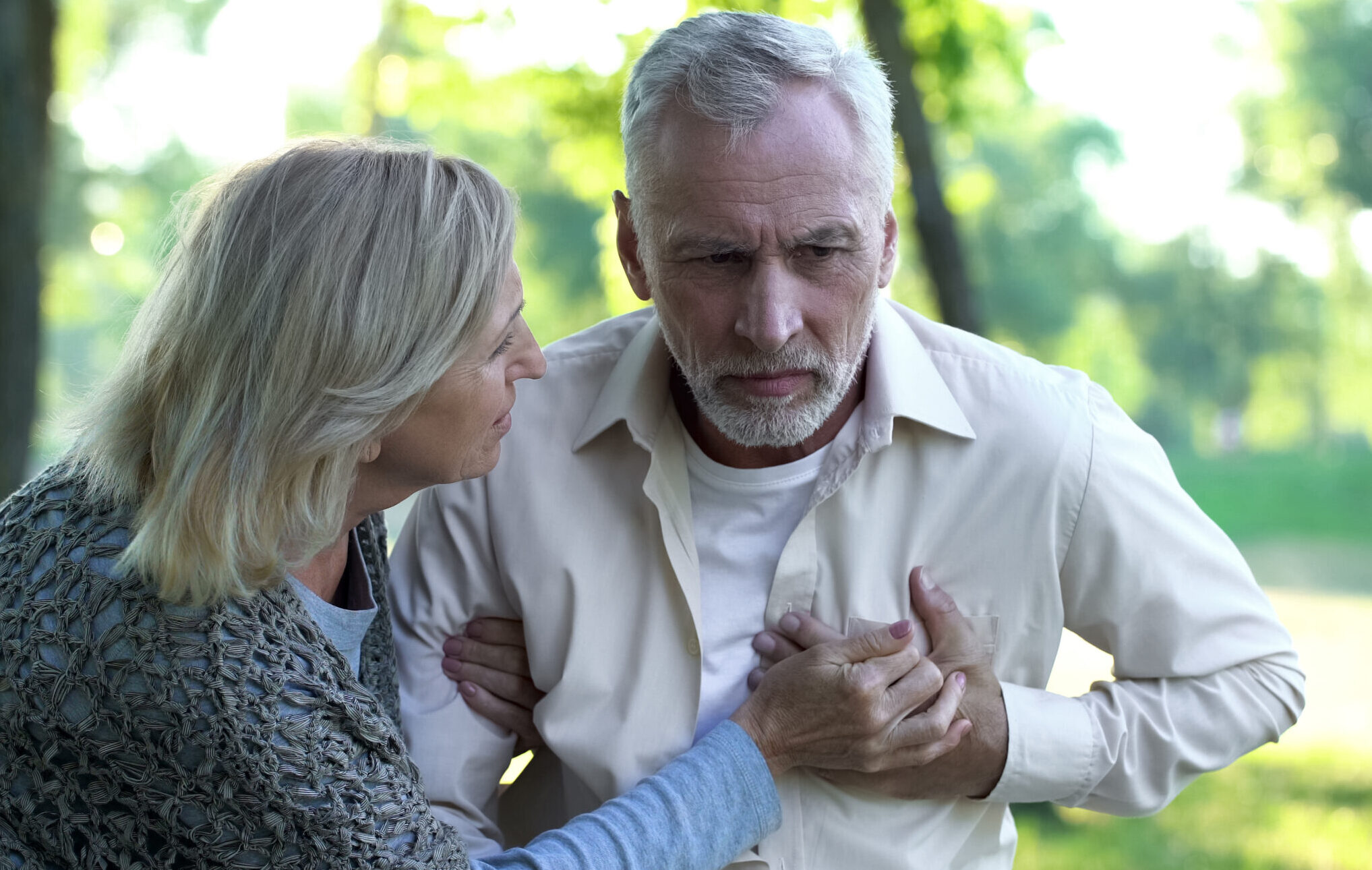Healthcare, pensioner suffering from strong chest pain, heart attack risk