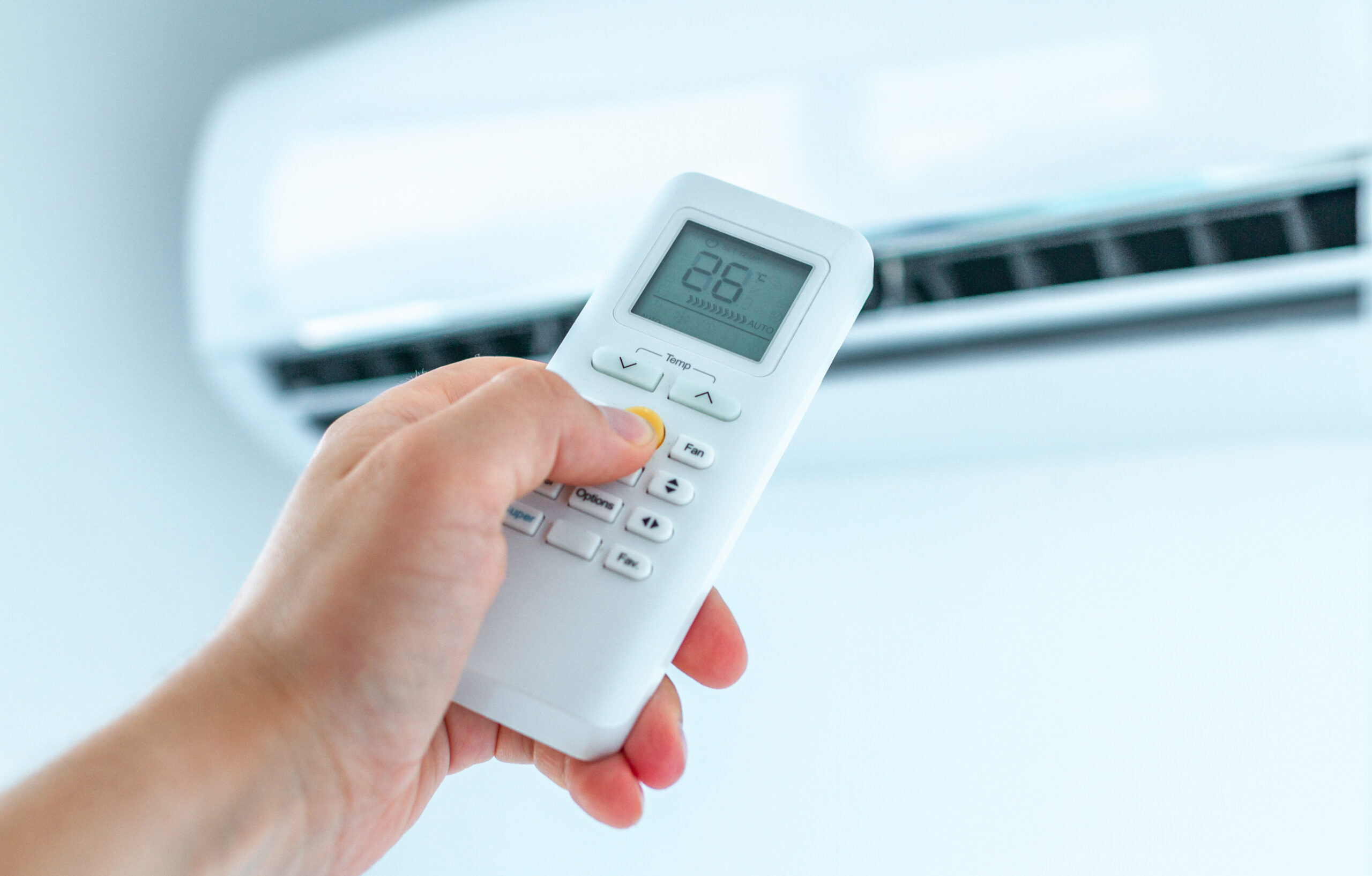 Air conditioner temperature adjustment with remote controller in
